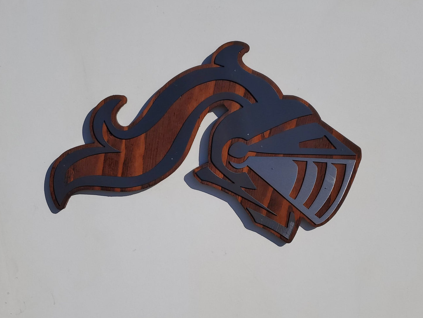 Metal Art Knights Helmet on Stained Wood