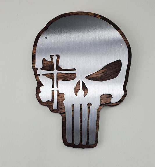 Punisher skull with a cross over an eye metal art wall hanging