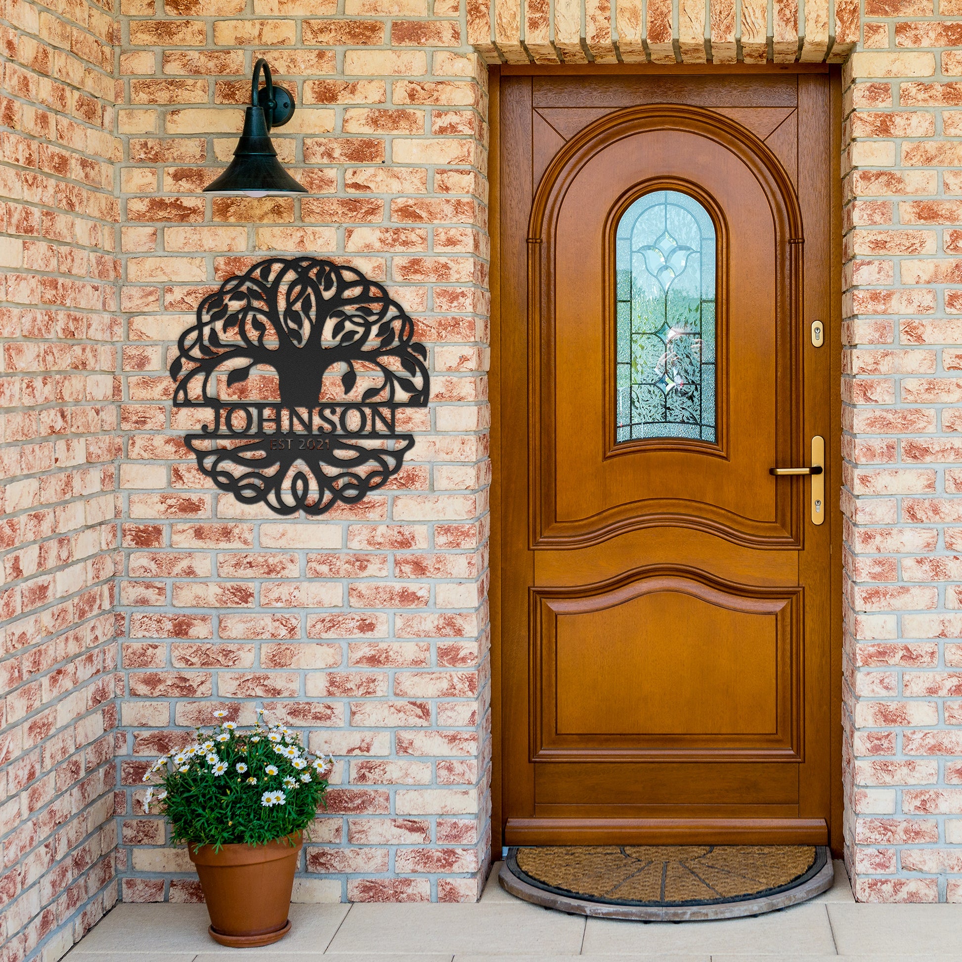 Tree of life monogram shown by front door