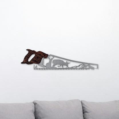 Whitetail deer hand saw wall art with two bucks, hanging above a gray couch