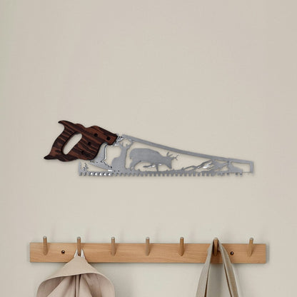 Whitetail deer hand saw wall art with two bucks, hanging above a coat rack in an entryway