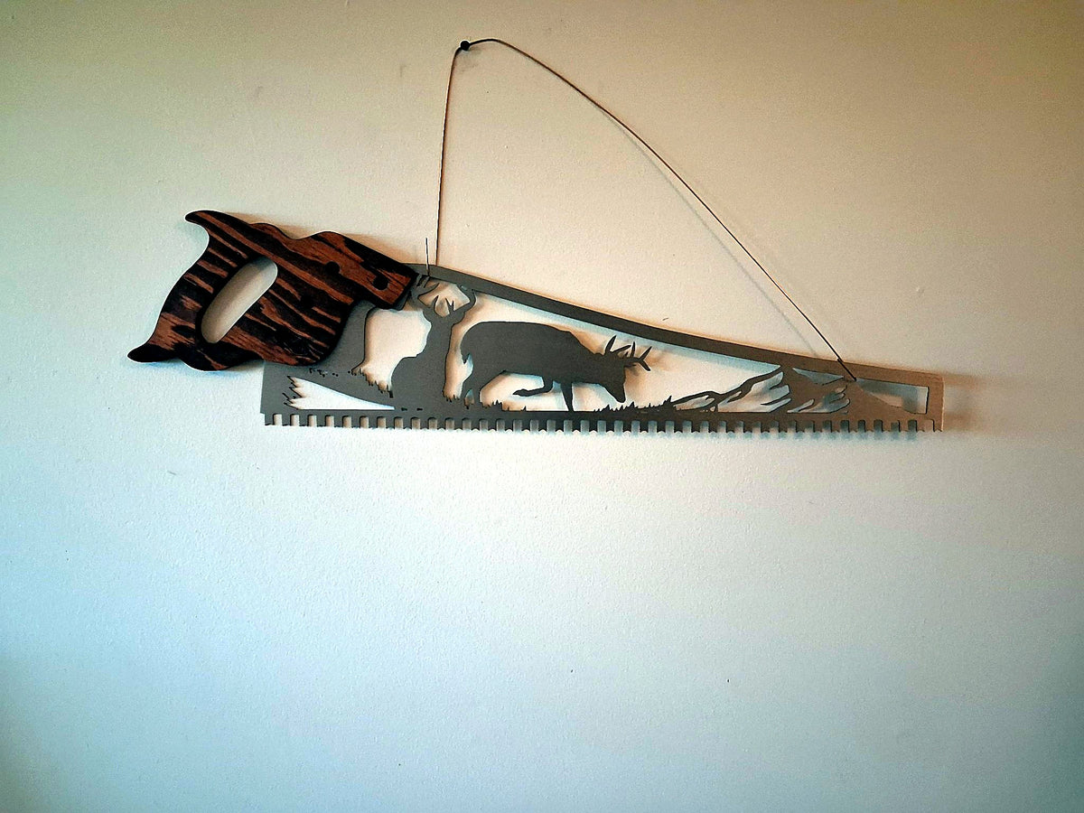 Whitetail deer hand saw wall art, two bucks in a wilderness scene cut out of saw-shaped steel (1)