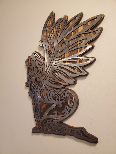 Enchanting Fairy Metal Art on Rustic Wood