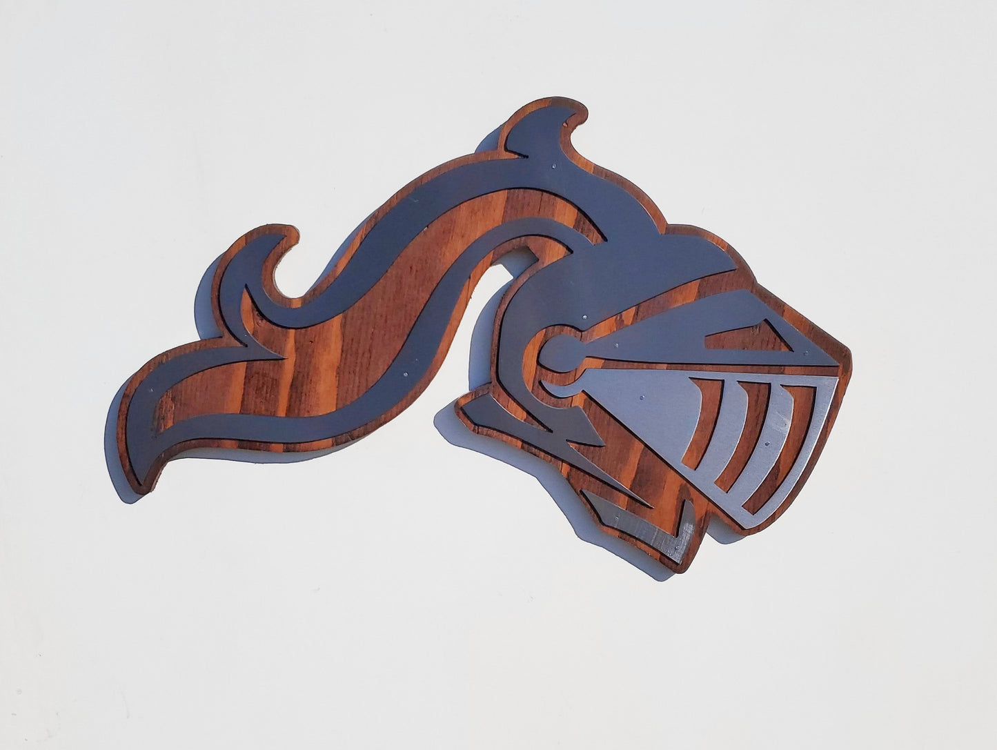 Metal Art Knights Helmet on Stained Wood