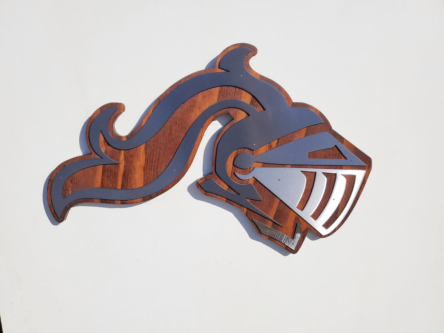 Metal Art Knights Helmet on Stained Wood