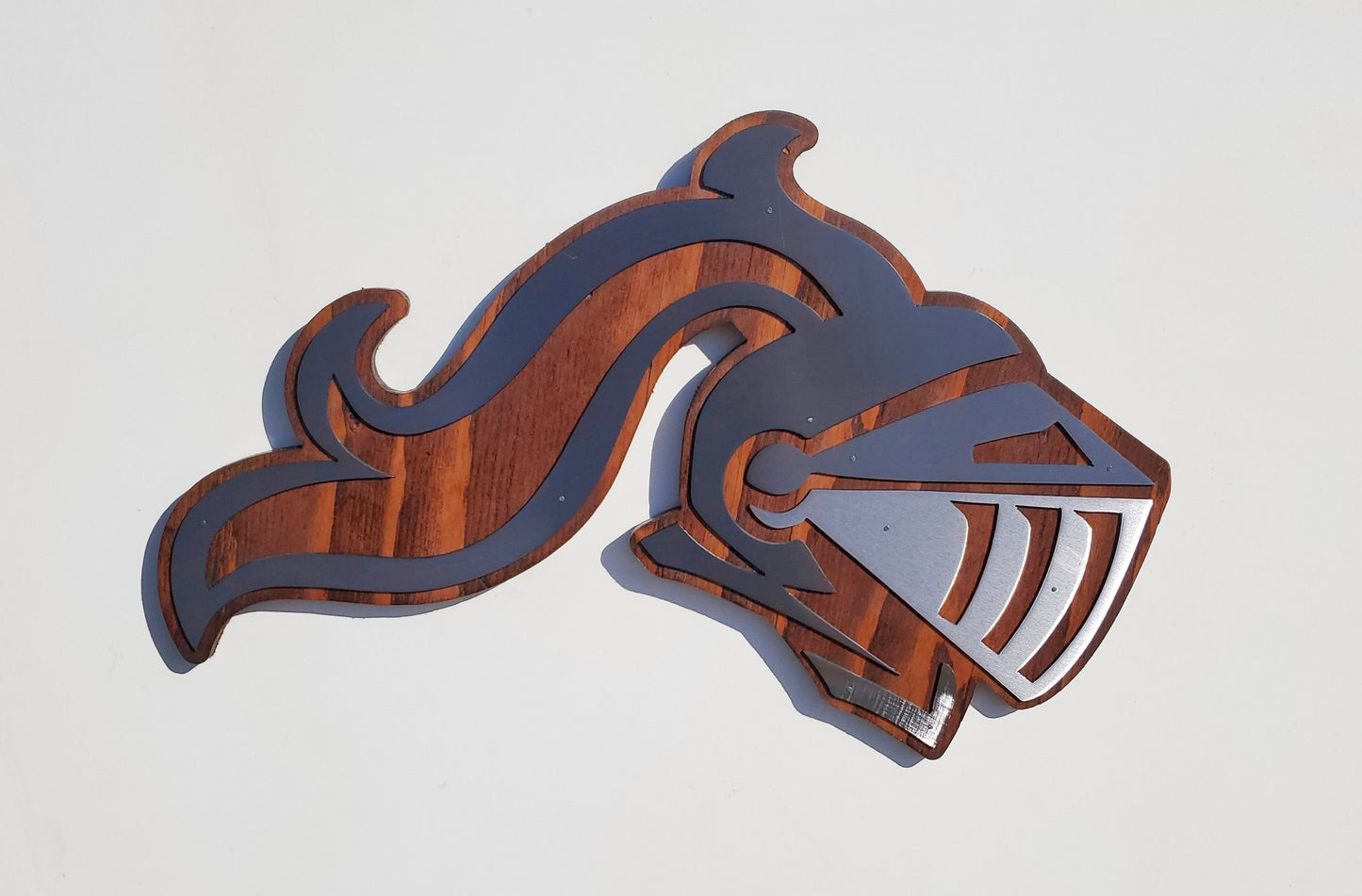 Metal Art Knights Helmet on Stained Wood