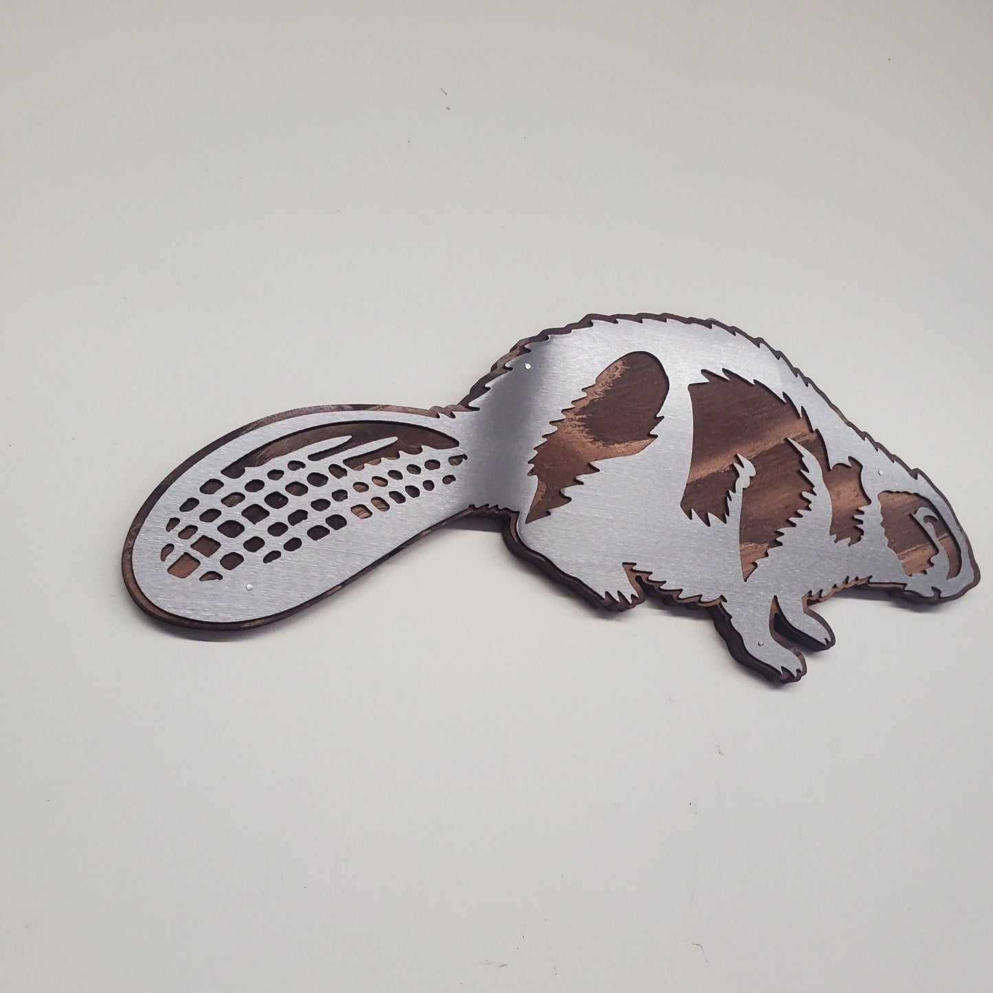 Beaver metal art on wood