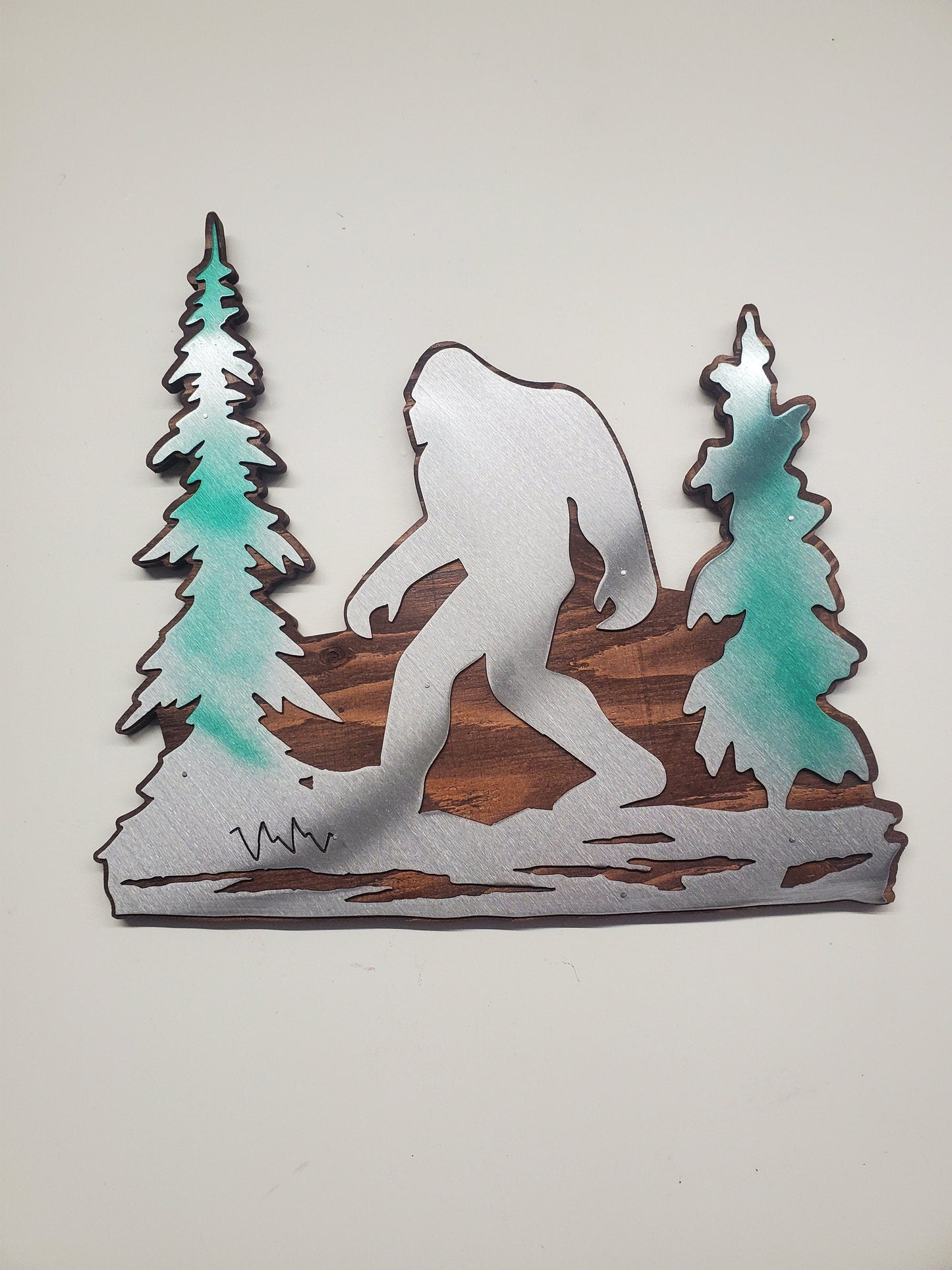 Bigfoot in trees metal art on wood Made in USA