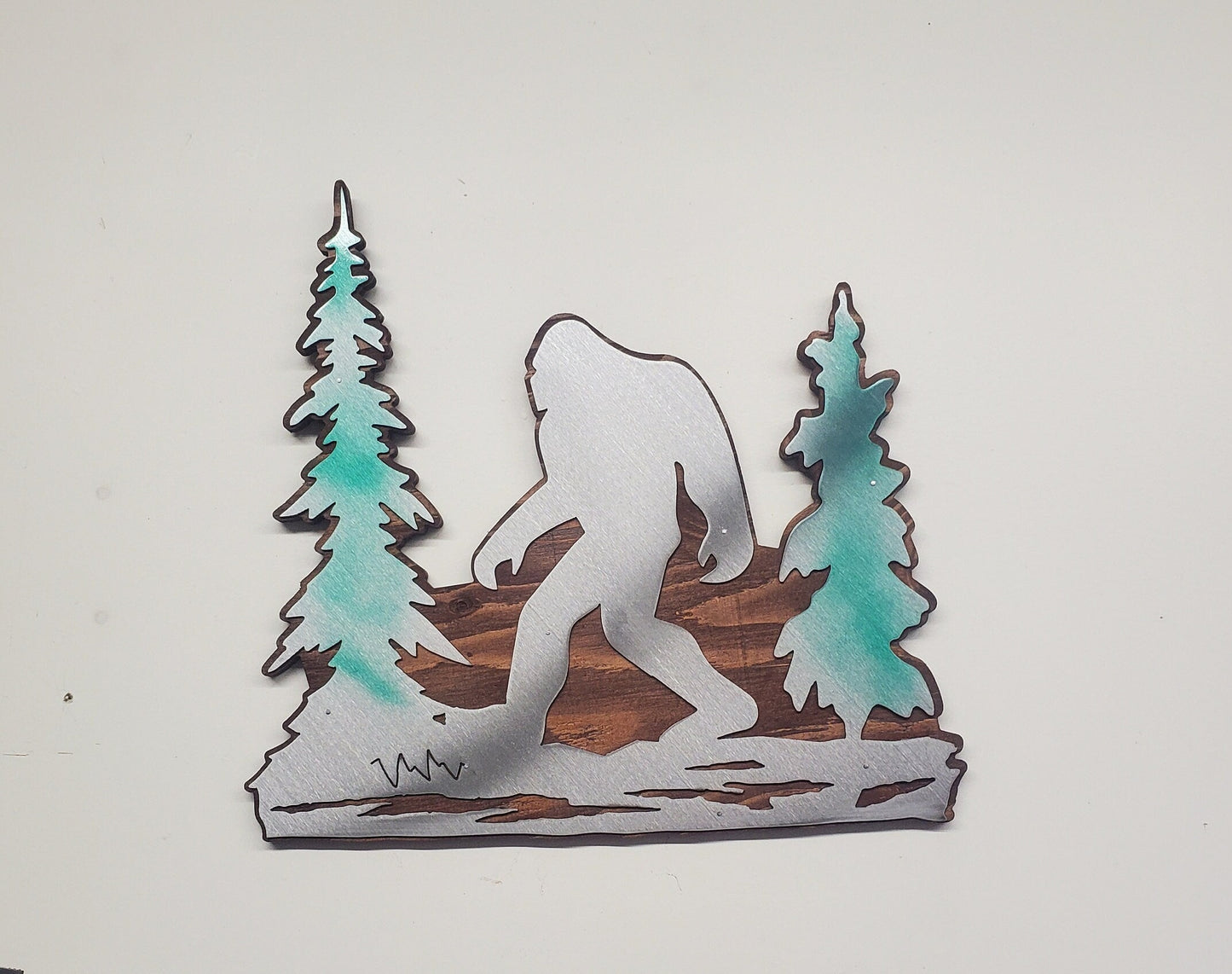 Bigfoot in trees metal art on wood Made in USA