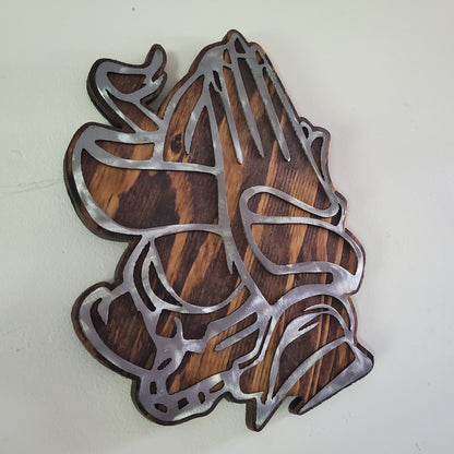 The Praying Hands showing of Faith metal art on wood wall décor is the perfect way to show your appreciation for the spiritual side in your life. This unique piece of art is finished by hand