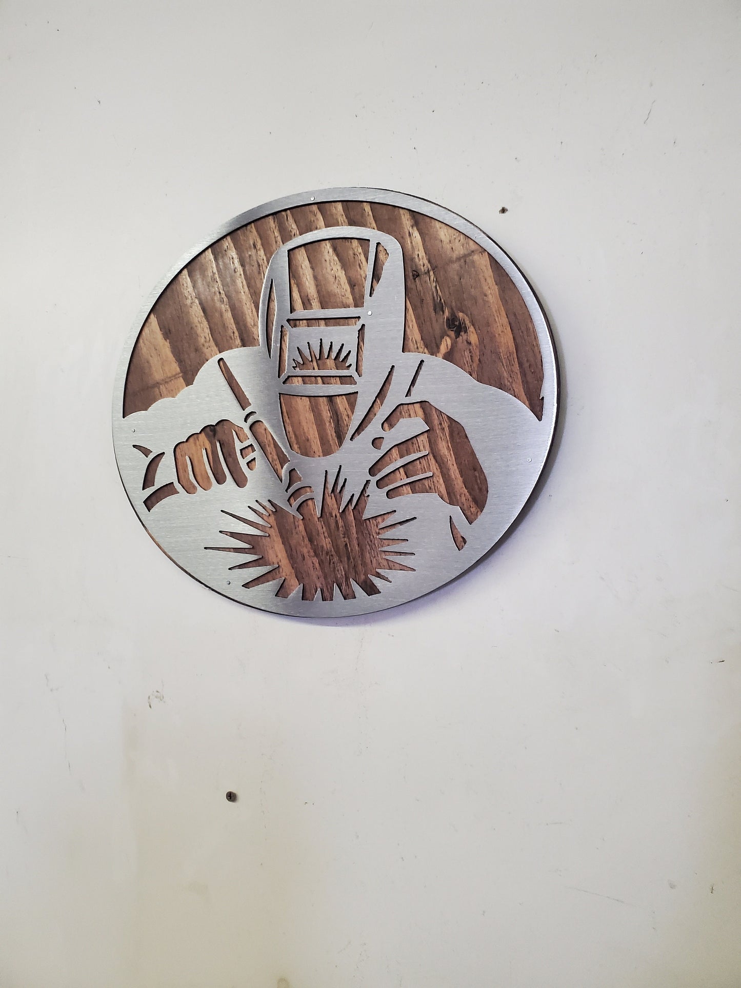 Welding Craftsman Metal Art on Wood
