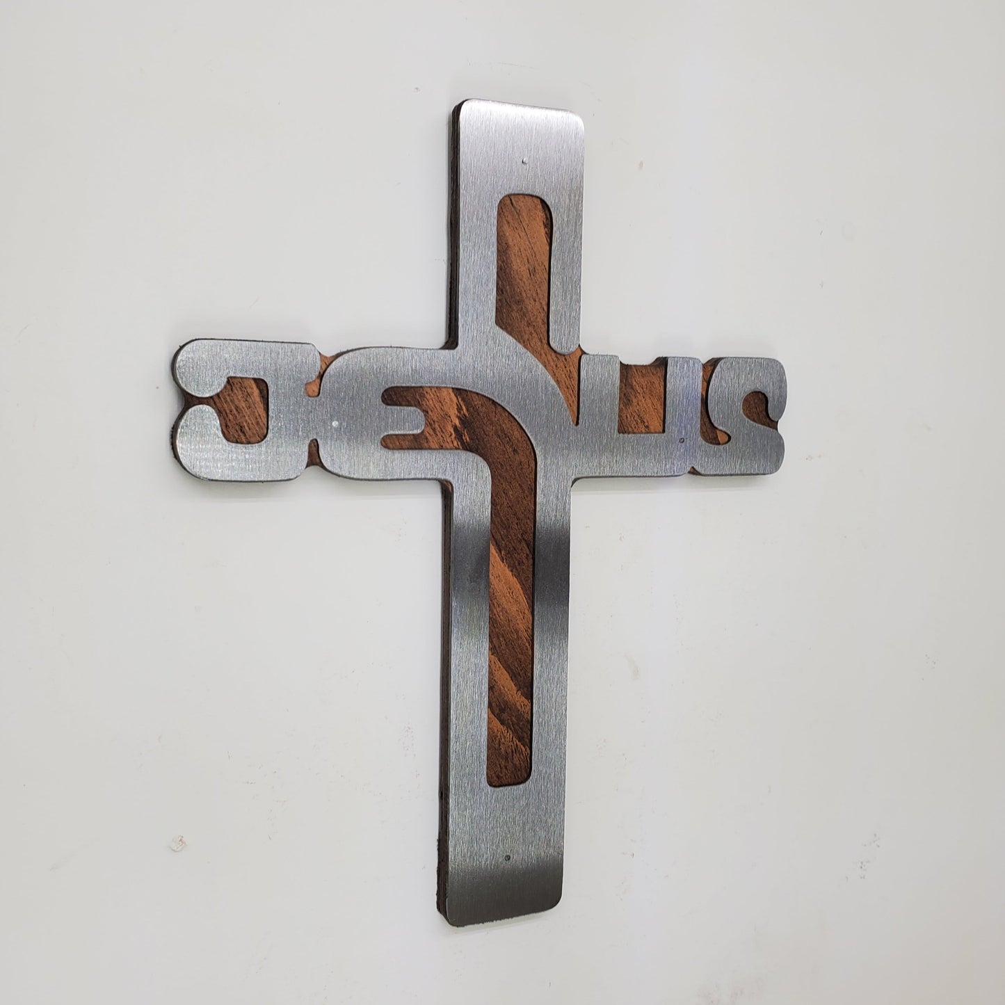 A perfect gift to show your love and faith for the Jesus Christ - with our lively and stunningly religious metal wall art on stained wood background.