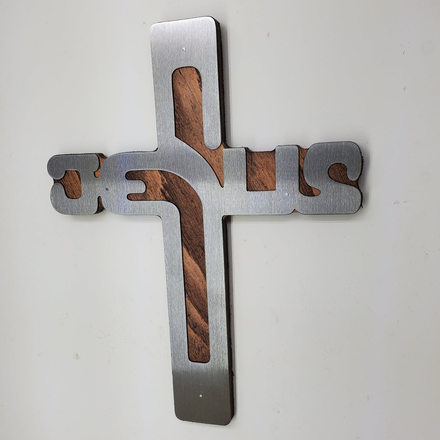 A perfect gift to show your love and faith for the Jesus Christ - with our lively and stunningly religious metal wall art on stained wood background.