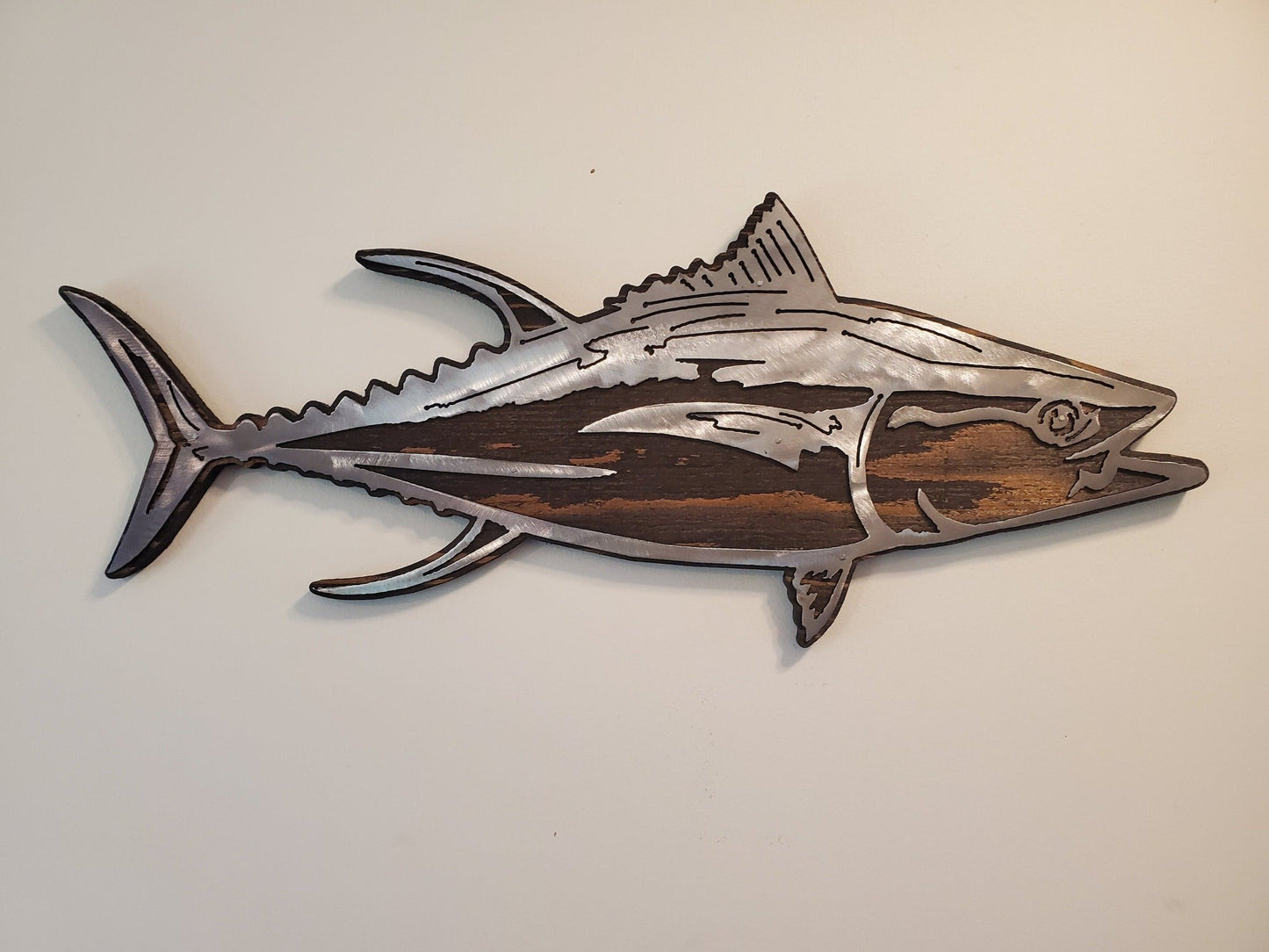 Tuna fish metal art on rustic stained wood background. Easy to hang. Unique gift idea