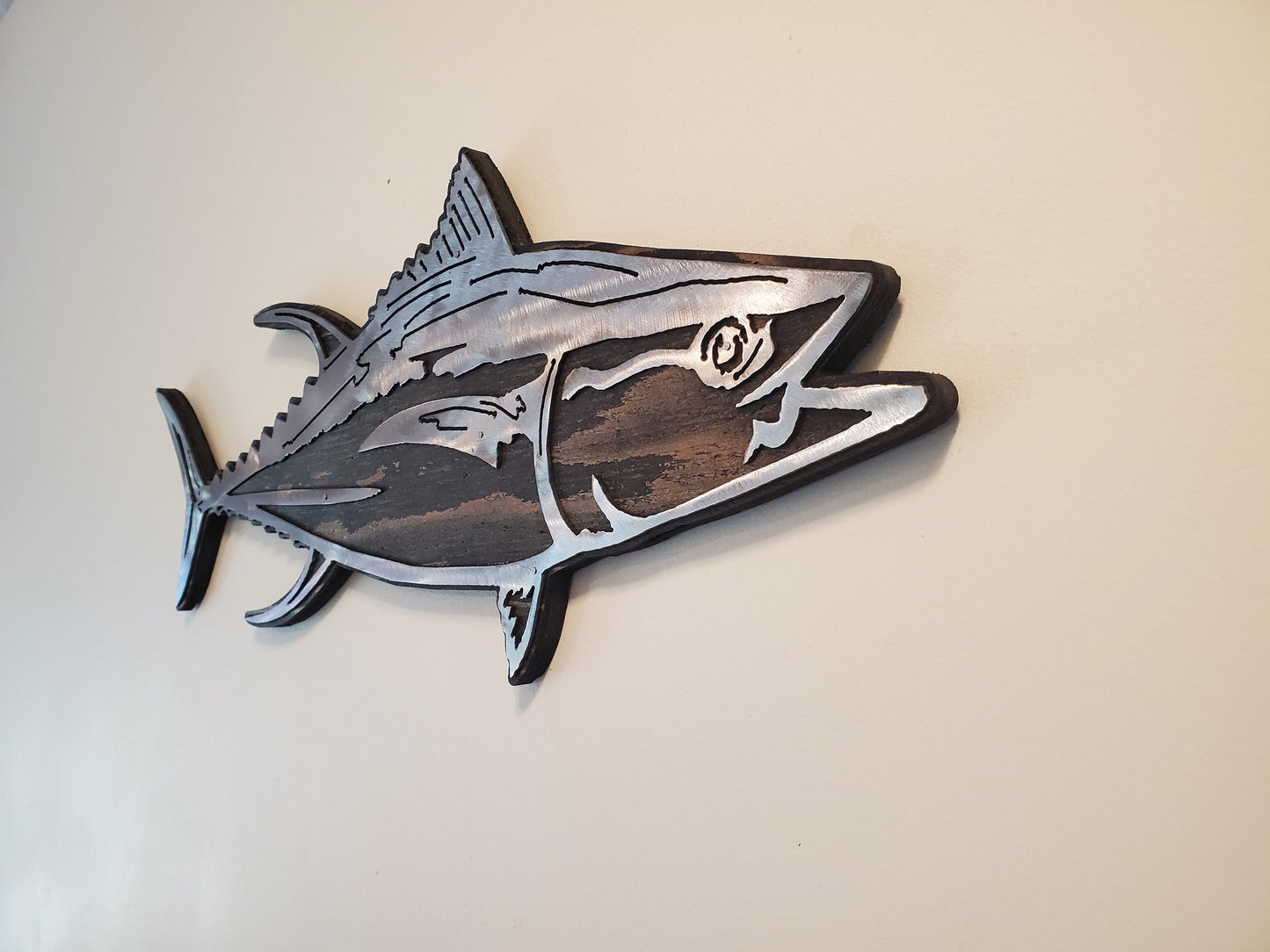 Tuna fish metal art on rustic stained wood background. Easy to hang. Unique gift idea